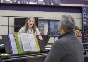 Olivia Smith practicing with pianist.