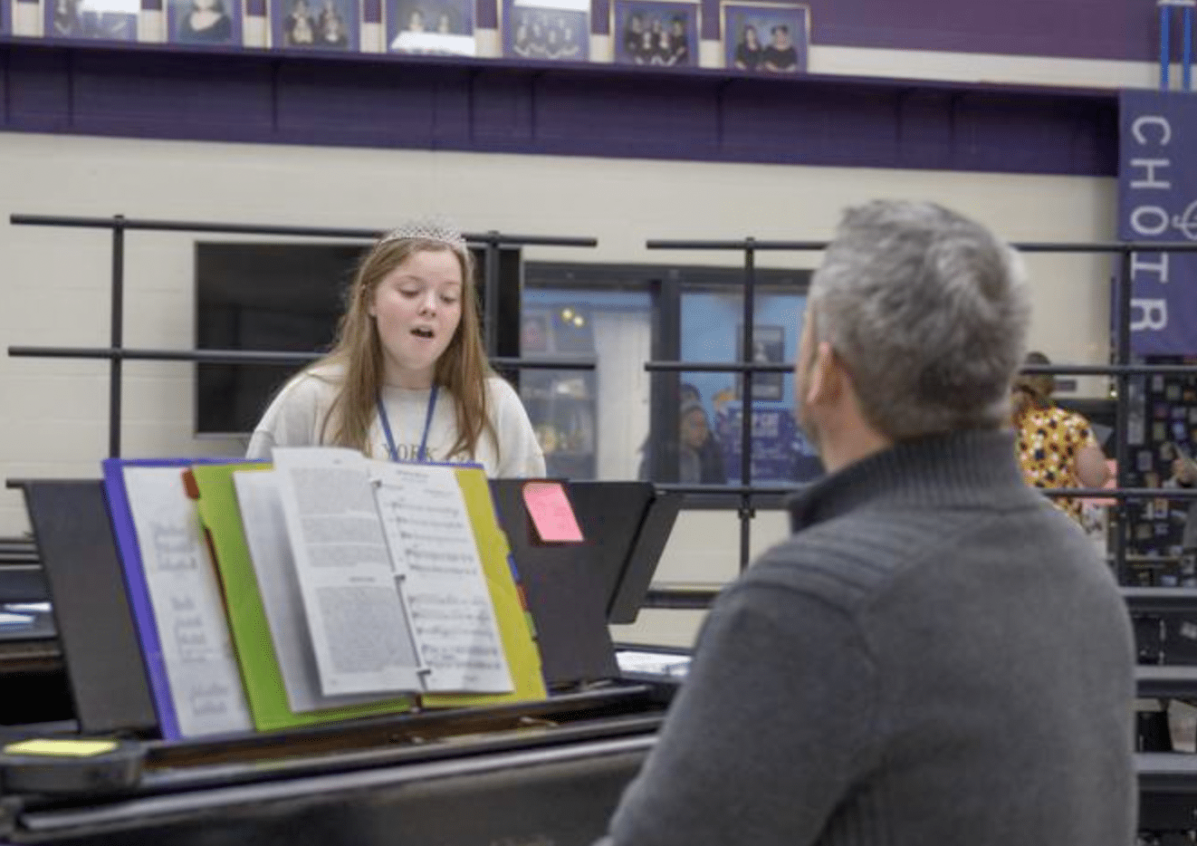 Olivia Smith practicing with pianist.