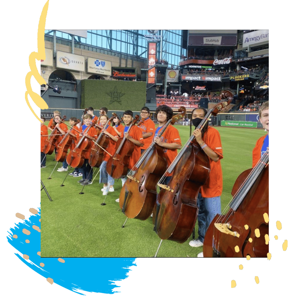 Fine Arts cello students on football field