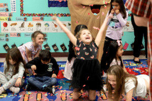 Students celebrating the good news.