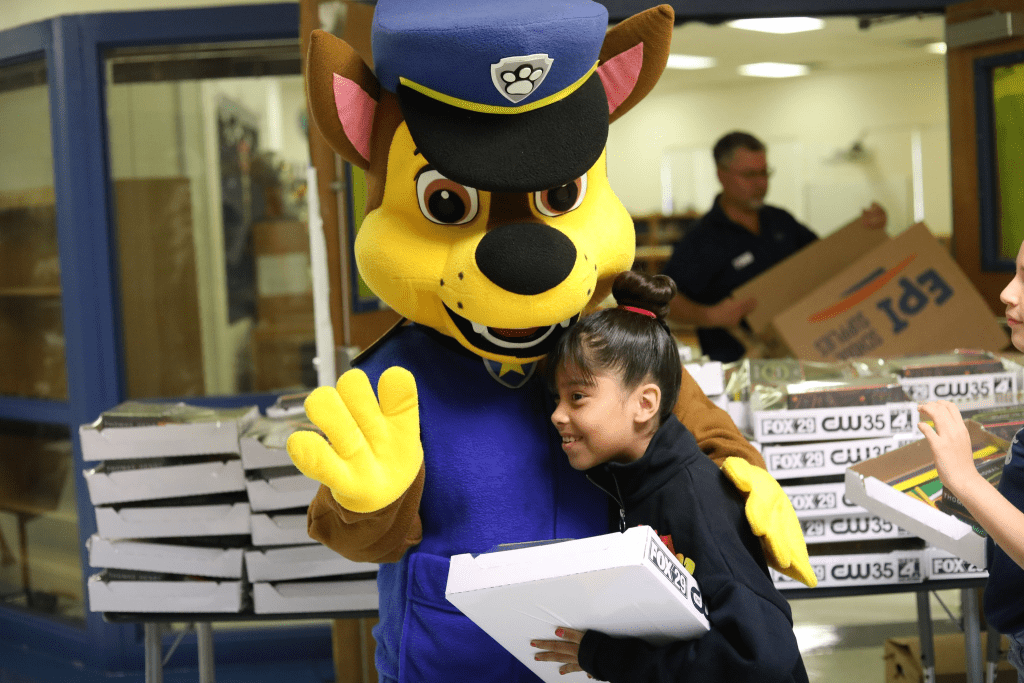 student with supplies a PAW Patrol