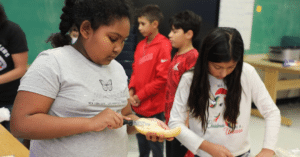 Students enhance their cooking skills.