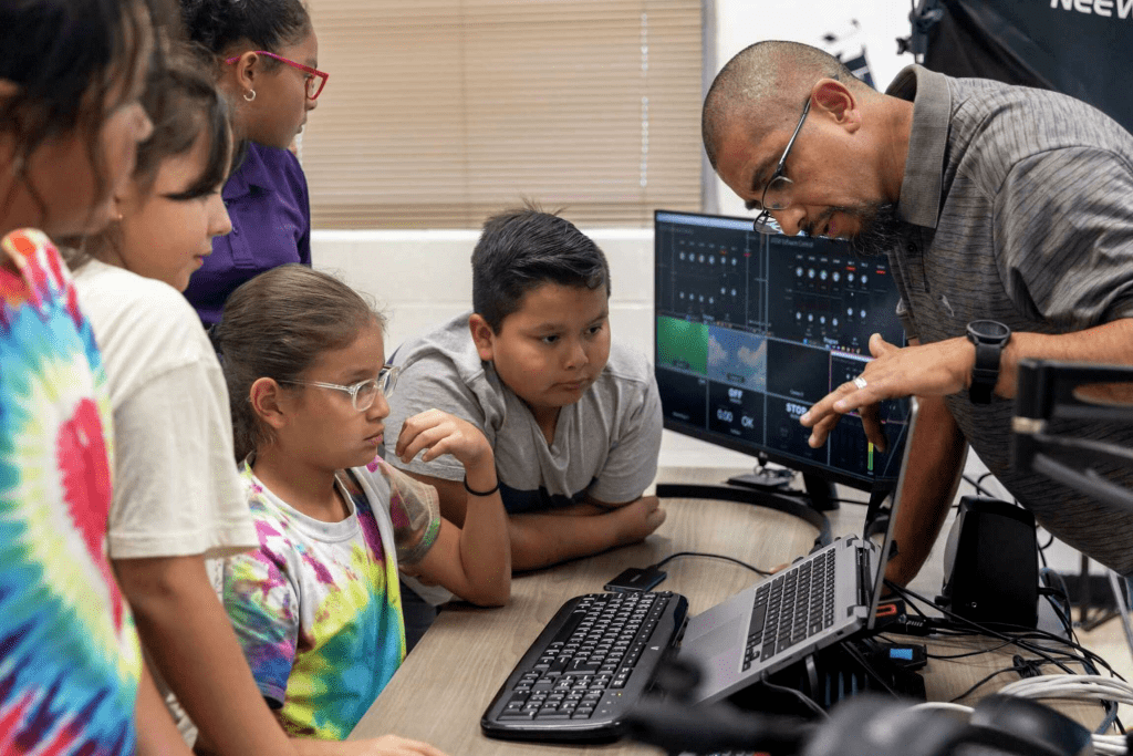 Edgewood students learning with teacher