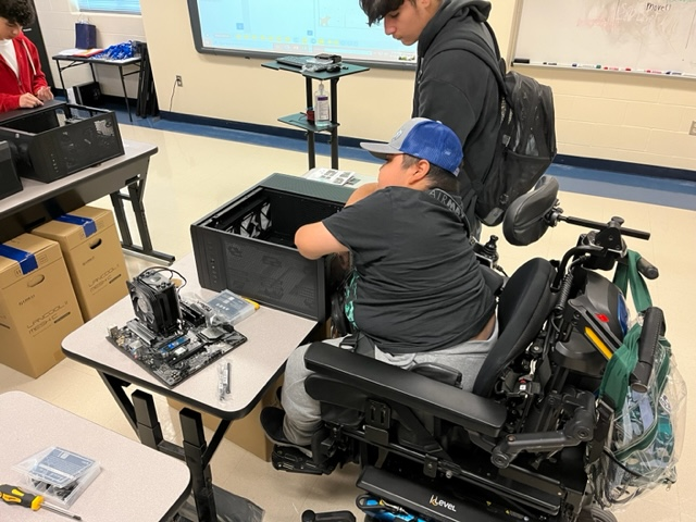 IT student learning to make a computer