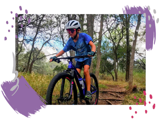 Roan Forest fourth-grader Naia Moctezuma competes in races all over Texas. She recently won the 2023 USA Cycling Texas State Mountain Biking Championship while wearing her Roan Forest shirt.