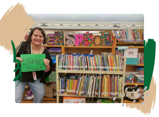 One Judson ISD librarian announces a huge shelf of new arrivals to the school library.