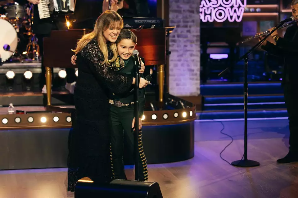 Mateo Lopez hugging Kelly Clarkson on "The Kelly Clarkson Show"
