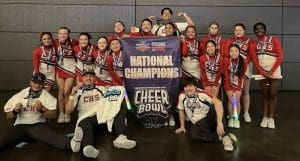 CISD CHS Cheer Team posing with awards