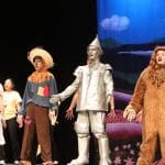 Students as Dorothy, Scarecrow, Tin Man, and Cowardly Lion from The Wizard of Oz