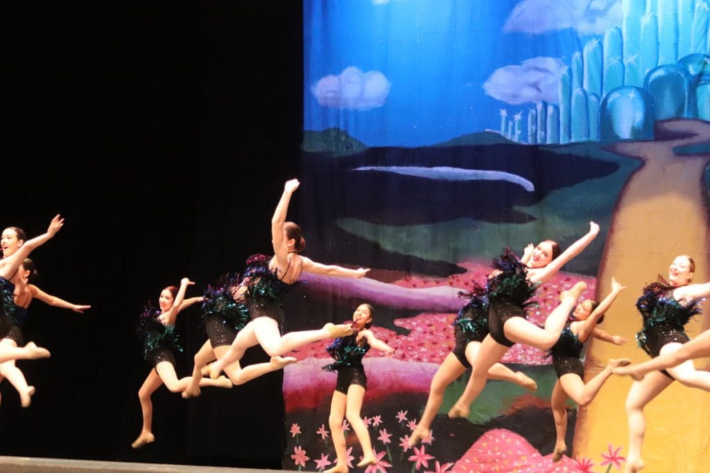 Company dancers leaping