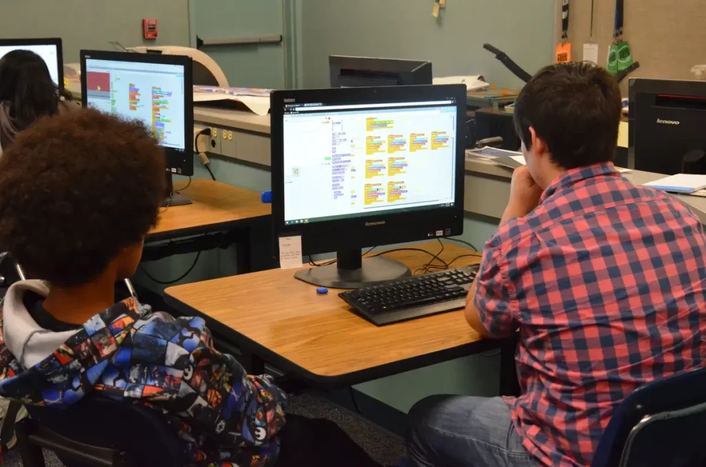 Lackland ISD CTE students working on a computer
