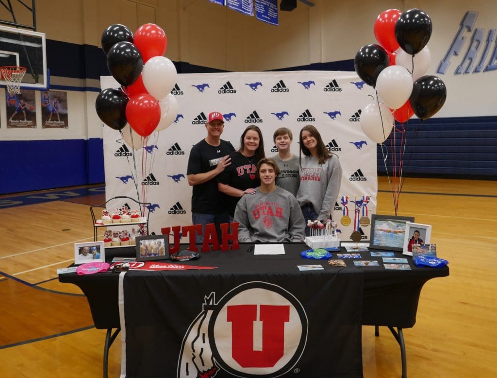 Student and family for signing day