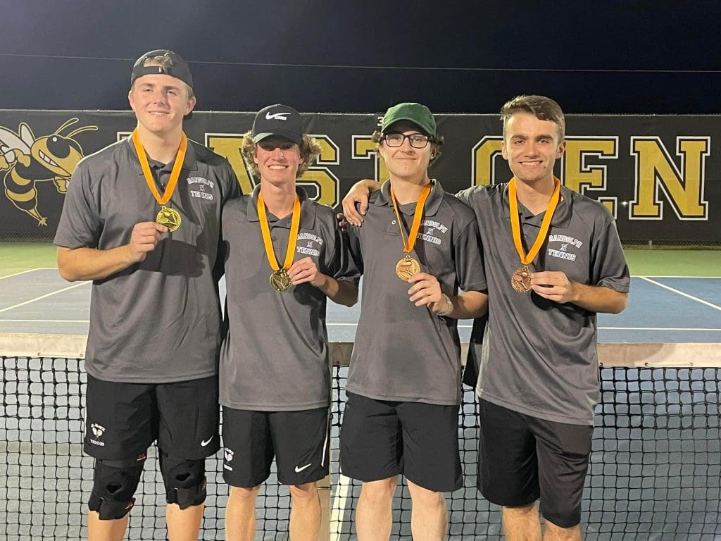 RHS boys tennis posing with their medals