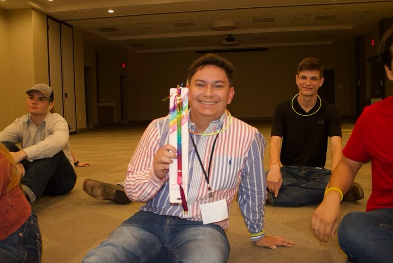 Zach Casas participates in workshop at FFA event.