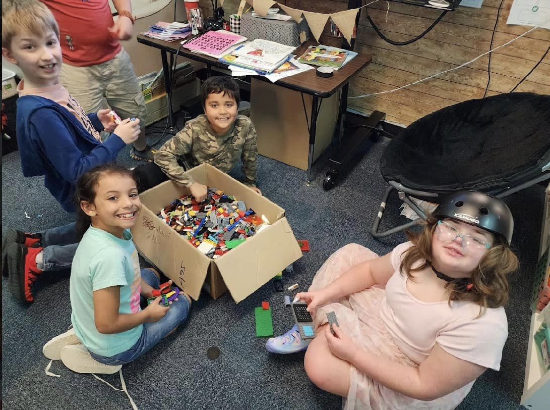 Inclusive Program playing Legos.