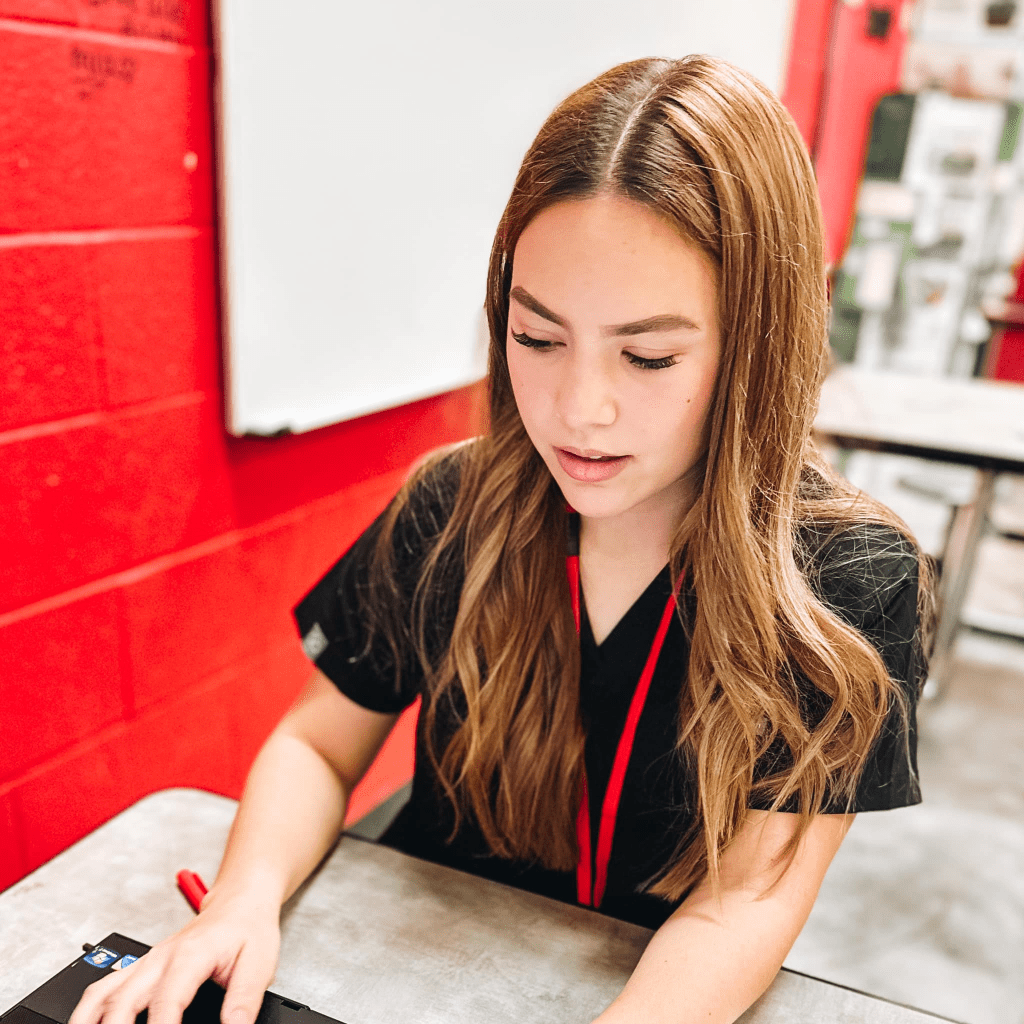 Crosby High School Nurse student checking laptop