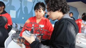 Cedar Hill ISD student looking at drone