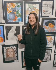 abilene isd student showing off artwork