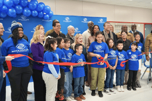 Students cutting the ribbon at Boys & Girls Club Ceremony