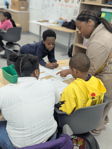 Crandall ISD Peer Teaching Practice Teacher Helping Students