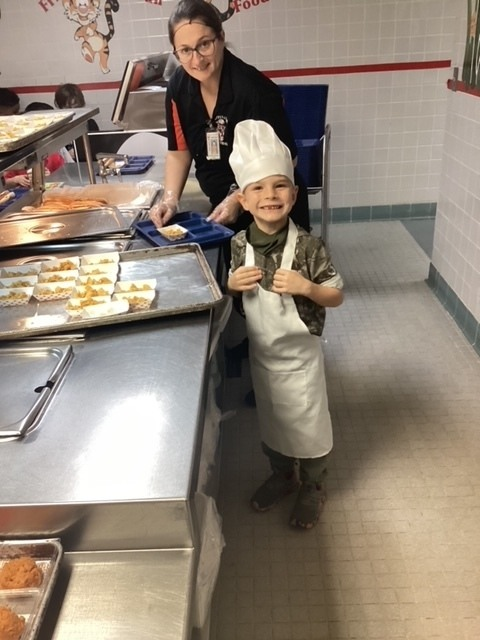 Brown Primary student in cafeteria