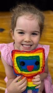 Eanes ISD barton creek elementary student holding plushie