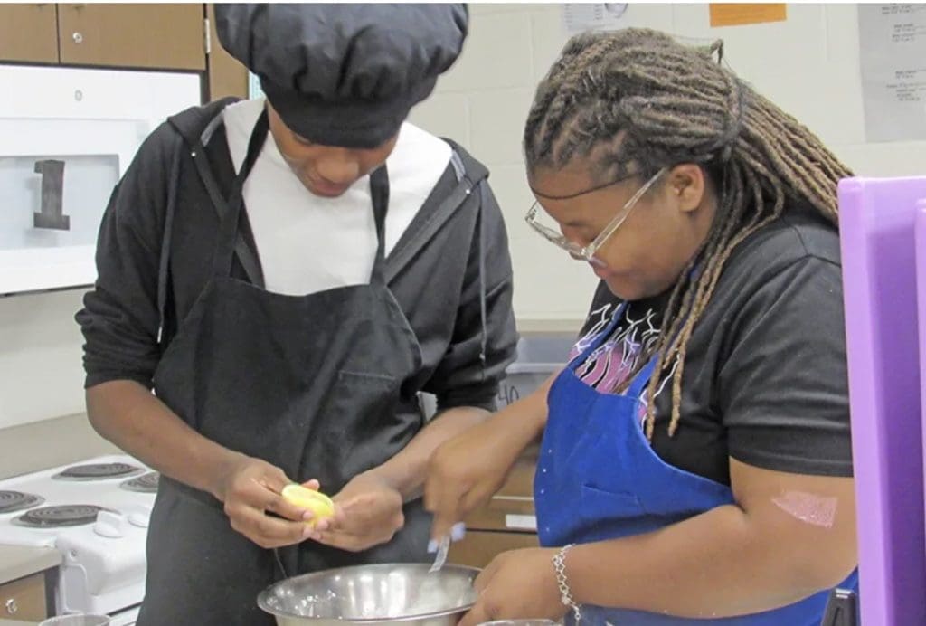 CFISD Student learning culinary skills