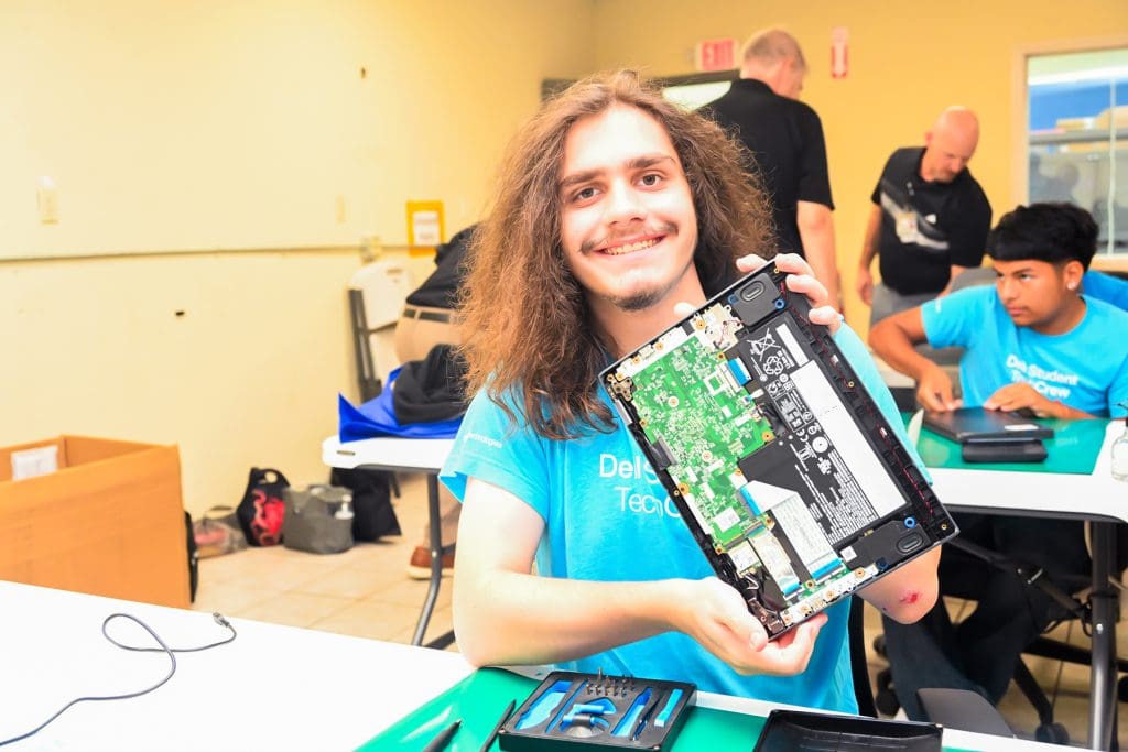 CFISD Student disassembling a Chromebook
