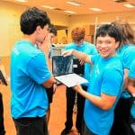 CFISD IT students holding Chromebooks