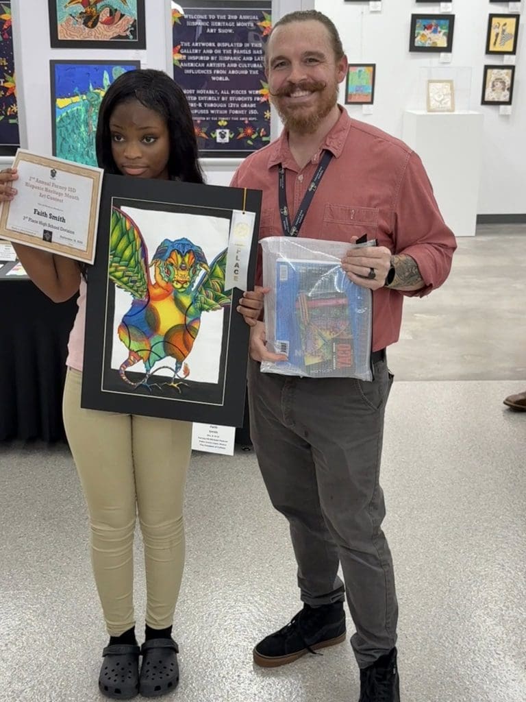 Forney ISD holding an award winning art piece