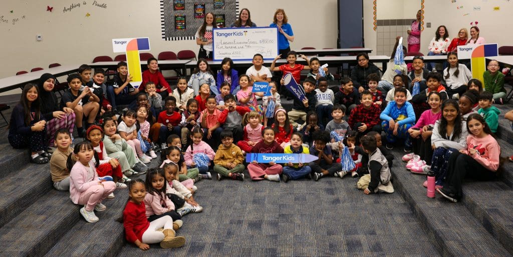 HEB ISD TangerKids award with students