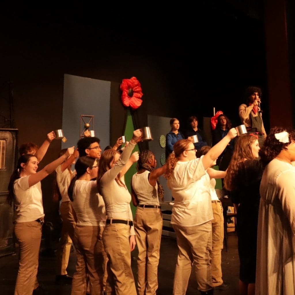 Kennedale ISD students raising cups in toast